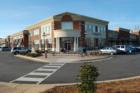 Tyron Village in Cary is nearly completed.  Offers Harris Teeter, Walgreens, a gym, and small shops and eateries, with a beautiful classic stone theme.