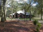 20 Acre Equestrian Estate Home in Gated Community.