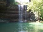 Hamilton Pool Preserve, Dripping Springs, TX.
      Formed after thousands of years of erosion, the dome of an underground river collapsed and the beautiful Hamilton Pool Preserve was formed.  To learn more visit www.co.travis.tx.us/tnr/parks
      