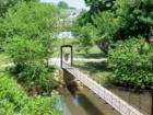 Suspension Bridge crossing over to Baker Park from Carroll Parkway