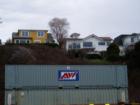 View of Eldridge homes from the harbor, train tracks in front of homes