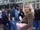 Enjoying the fake snow and parade at Dickens.