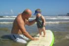 Surfing is a staple of life in Galveston, Texas.  We start them out young.  This photo features my son when he was a baby.