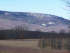 Shawangunk Mountain cliffs and valley in winter.