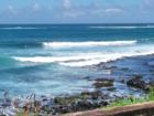 surfing small waves on the north shore of maui - kuau