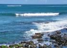 north shore maui surfing out front of Kuau
