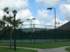 Lighted Tennis Courts for residents and guests - one of many reasons to choose Grand Lakes.