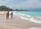girls on the beach at baldwin beach park paia maui hawaii