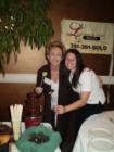 Liz Carter & friend, dipping into the chocolate fountain Liz Carter & Team Realty donnanted for the Cinco Ranch Ladies Club meeting of "For the love of art & choclate"