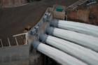 A close up photo of the 15 foot in diameter hollow jet tubes at Glen Canyon Dam open during the 2008 floods. 300,000 gallons of water a second are heading down the river to help rebuild habitat.