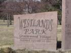 Entrance sign to Westlands Park in Greenwood Village