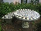 Mosaic table in courtyard at Towle's Court, artist colony.