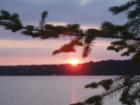 A Beautiful start of a day on Big Sandy Lake over looking Billhorn Bay. McGregor Minnesota summer is a great place to spend up north at the lake.
