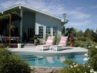 This solar heated pool is the perfect place to spend an afternoon when you purchase this custom home on acreage!  Call 766-0300 and ask for Kathleen!  See more views at www.KathleenMiles.com 