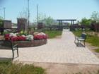 One of the seating areas to take a rest and enjoy the flowers and mountain views at Shamrock Estates.