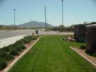 Looking South down Higley Rd past the esntrance to Shamrock Estates.