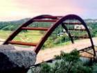 A fun bridge to go under with a boat.