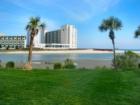View from the Dunes Club looking over the marsh to toward the Sands Beach Club. Great photo taken by my teenage daughter.  She helps me out occasionally in real estate by taking some great photographs.