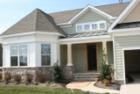 The Monterey, still under construction in March 2008. Exterior stone was carried on over to the porch - beautiful! Columns still to be painted, door to be installed.