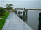 Dock side view from a home located in the southwest Section of Cape Coral Florida