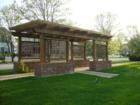Pergola in center median at Hometown, Oswego
