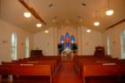Beautiful incide of Bolin Chapel in Katy, TX.  All wooden pews were handmade.  Photo by Liz Carter, Realtor