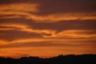 Sunset from our Hallmark Backyard.
      Nikon D70
      Lens: Nikkor 18-200mm GED VR
      Date taken: May 14th 2008
      Time: 20:19:35
      f/5.6	1/20 exposure	 ISO 200	Handheld  200mm focal length
      
      