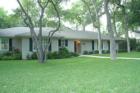 Example of a home in Richardson Heights on a creek lot with lots of trees.  This picture is property of Robbins Real Estate Group.