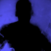 Self_portrait_2006_jrony_shadow_on_blue_obsidian__card