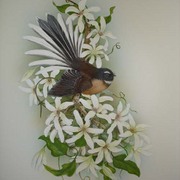 Pied_fantail_on_nz_clematis_card