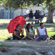 Balboa_park_-_red_umbrella_trio_card