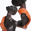 Afrikanerin_in_orangkleid_thumb