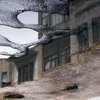 Y_reflection_-street_in_puddle_thumb