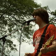 Max_singing_and_playing_for_sites_card