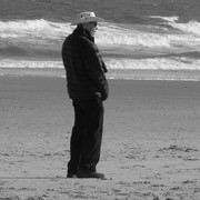 Old_man_in_cowboy_hat_on_beach_card