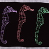 Triple_seahorses_merged_thumb