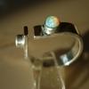 Ring_inlaid_moon_stone_thumb