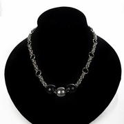 Blacksliders_necklace_card