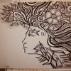 Mujer_con_flor_en_el_pelo_thumb