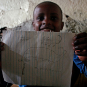 Boy_showing_his_picture_card