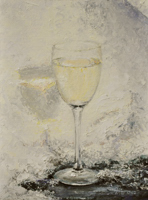 Chilled White glass of white wine against snow