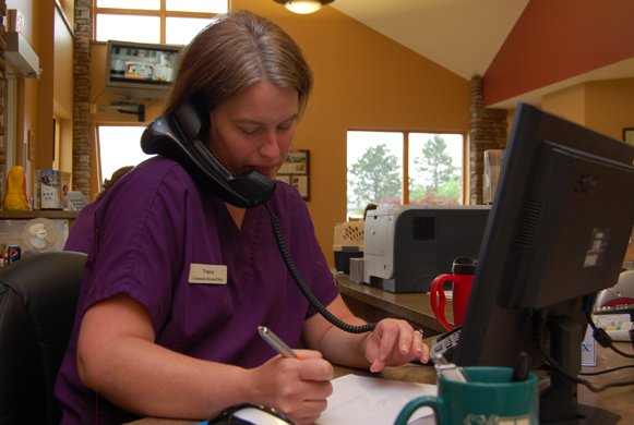 Tracie doing a patient visit follow up.