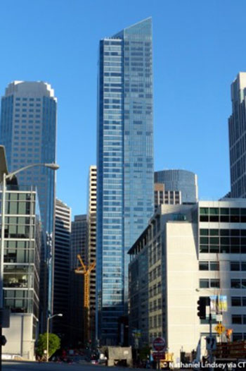 The suit alleged that the building was constructed on mud and sand, not bedrock located deeper in the ground.