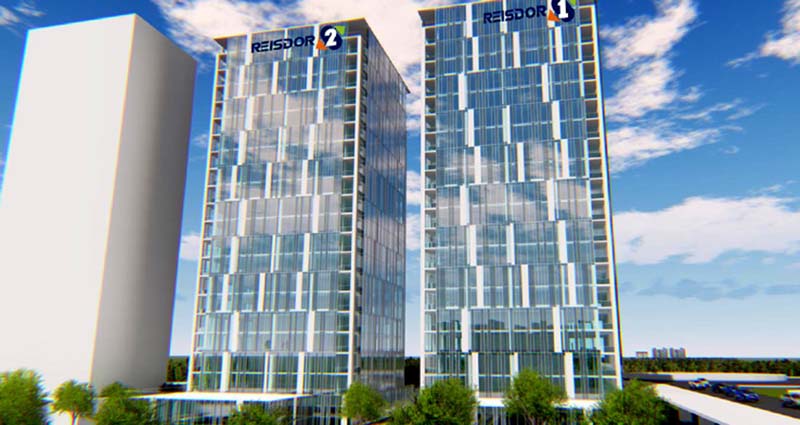 Two 21-floor office towers will be built on the combined parcels, which will also have commercial space and underground parking.