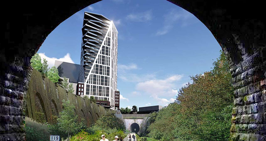 The mixed-use development will overlook the Bergen Arches, a former railroad trench that is transitioning to a “rails-to-trails” linear park. Rendering via MVMK Architecture.