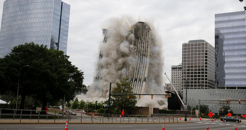Detonations begin to crumble the former headquarters of Dominion Energy on Saturday 27 May.