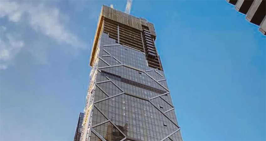 The gold-hued Paragon tower at 318 Queen Street has topped out.