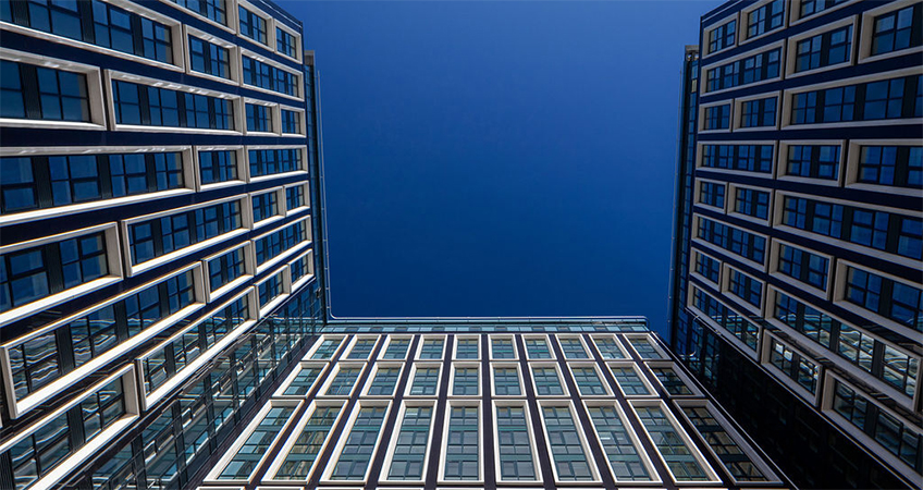 The build-to-rent development overlooks the waterfront.