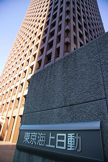 The Tokyo Marine Nichido Insurance Building was built in 1974 and is clad in reddish brown tiles.