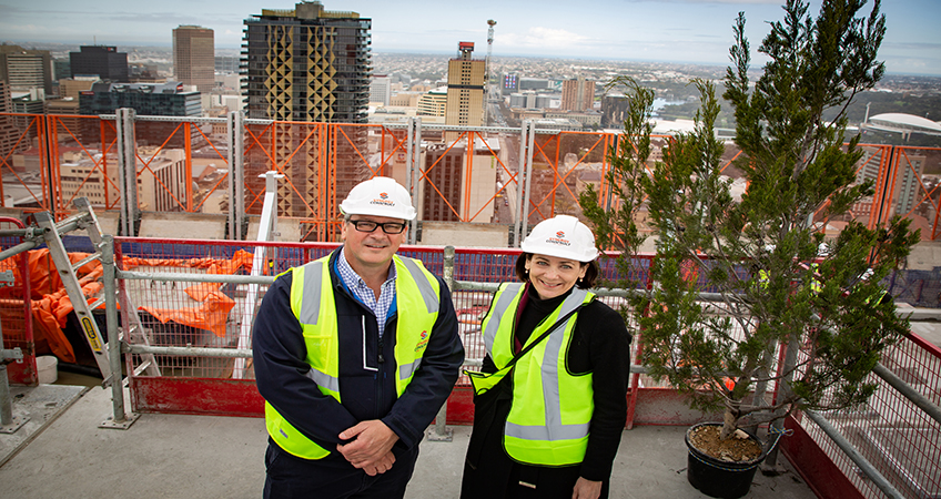 Yugo Managing Director - APAC, Tim Klitscher, with StudyAdelaide CEO, Karyn Kent, celebrate the topping out of Yugo Adelaide City. Image credit: Serena Findlay, Hughes PR